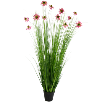Hoog kunstgras in een zwarte pot met roze margrietachtige bloemen op lange stelen, tegen een effen witte achtergrond.