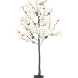 De Kunstplant Bougainvillea 150 cm wit is een hoge kunstboom met witte bloesemlichtjes en groene bladeren, in een zwarte cilindrische pot tegen een effen witte achtergrond.