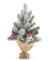 Kleine, met sneeuw bestrooide Kunstkerstboom mini Fjord van 37 cm, versierd met rode bessen en omhuld met een lichtbruine jutevoet.
