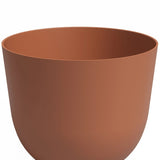 De Plantenbak Havanna Ø30cm x H25cm is een minimalistische, ronde bloempot in terracotta kleur met een gladde matte afwerking, tegen een effen witte achtergrond.