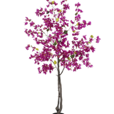 De Kunstplant Bougainvillea 180 cm Paars heeft donkere takken, levendige paarse bloemen en groene bladeren in een zwarte pot - perfect als kleurrijke kunstplant voor je woonkamer.