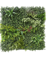 De Kunsthaag Prestige 100x100 cm UV is een vierkant paneel van kunstgroen gebladerte met gemengde bladplanten, varens, gevarieerde texturen en tinten groen, plus clusters van kleine witte en rode bloemen. De achtergrond is wit.